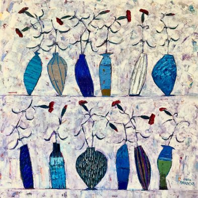 Goździki w wazonach