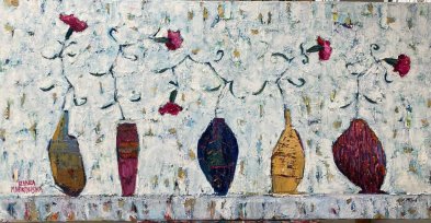 Goździki w wazonach